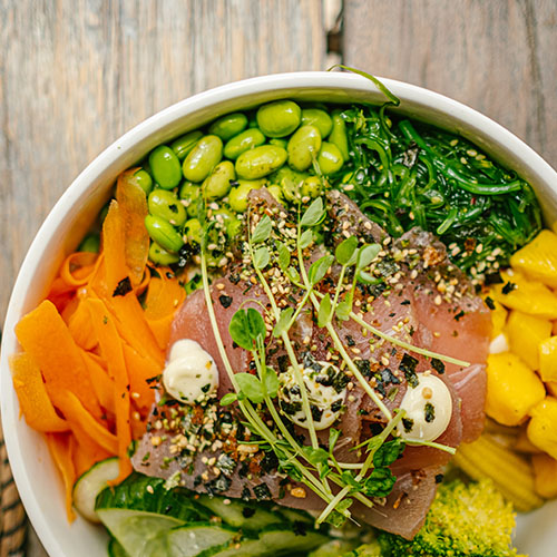 Vegetable bowl with fresh fish