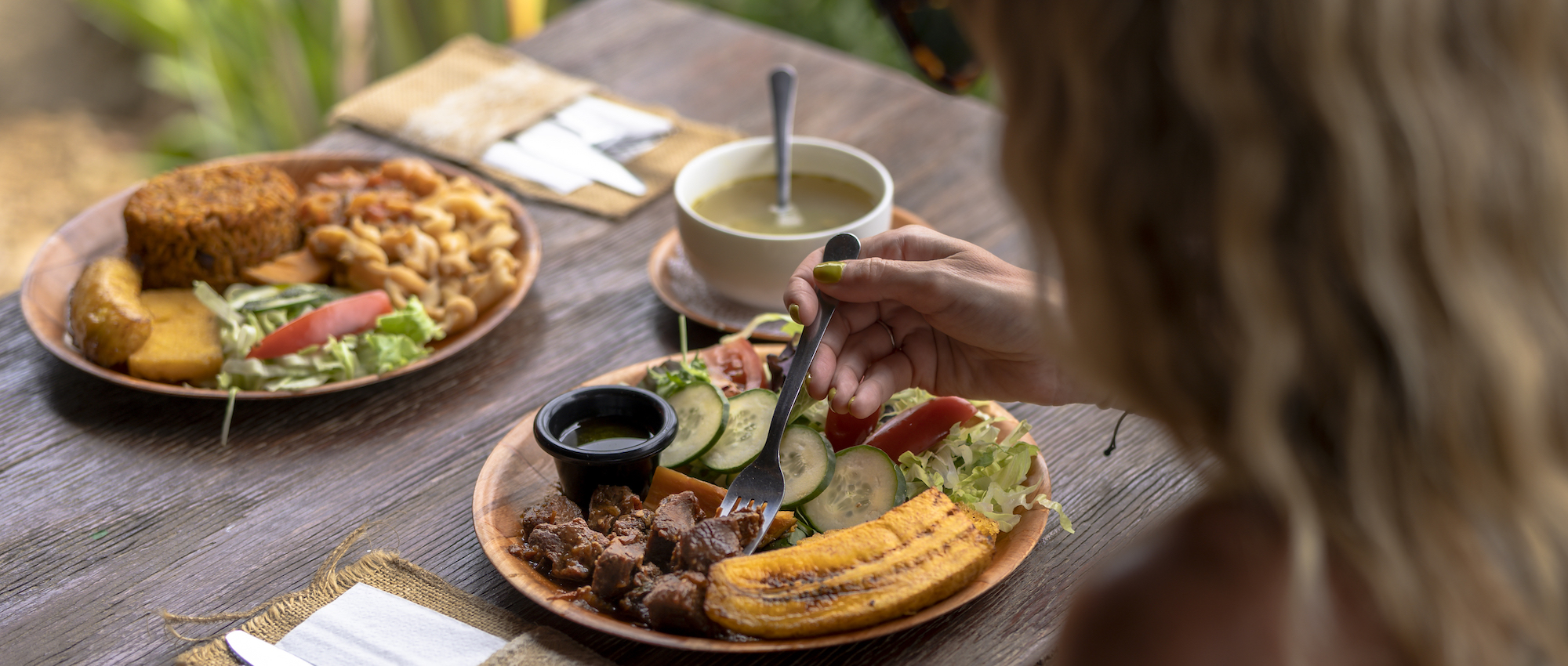 Woman eating plate of food