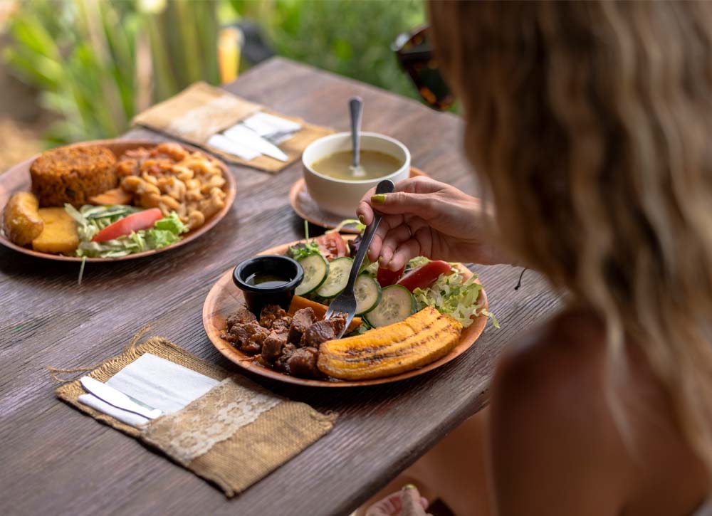 Woman eating plate of food