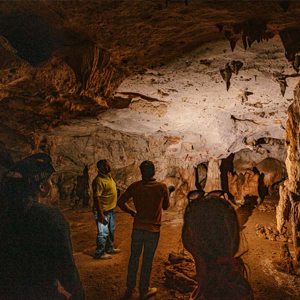 Group of people in cave