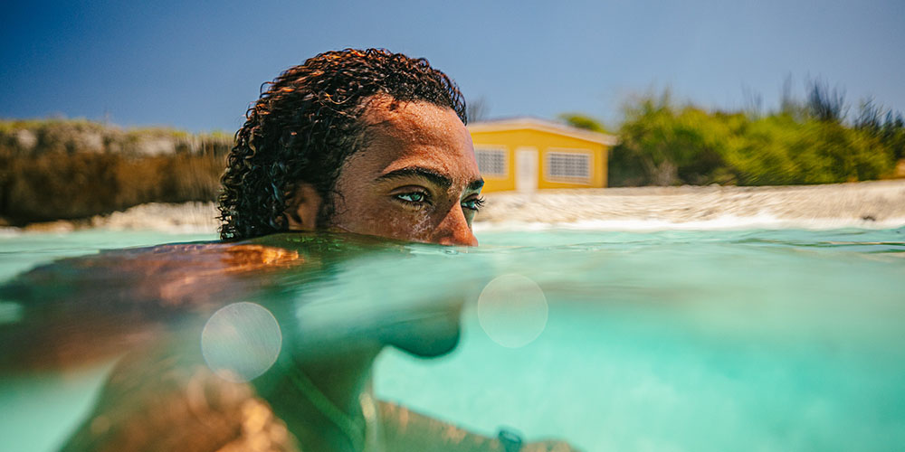Young man floating in the water